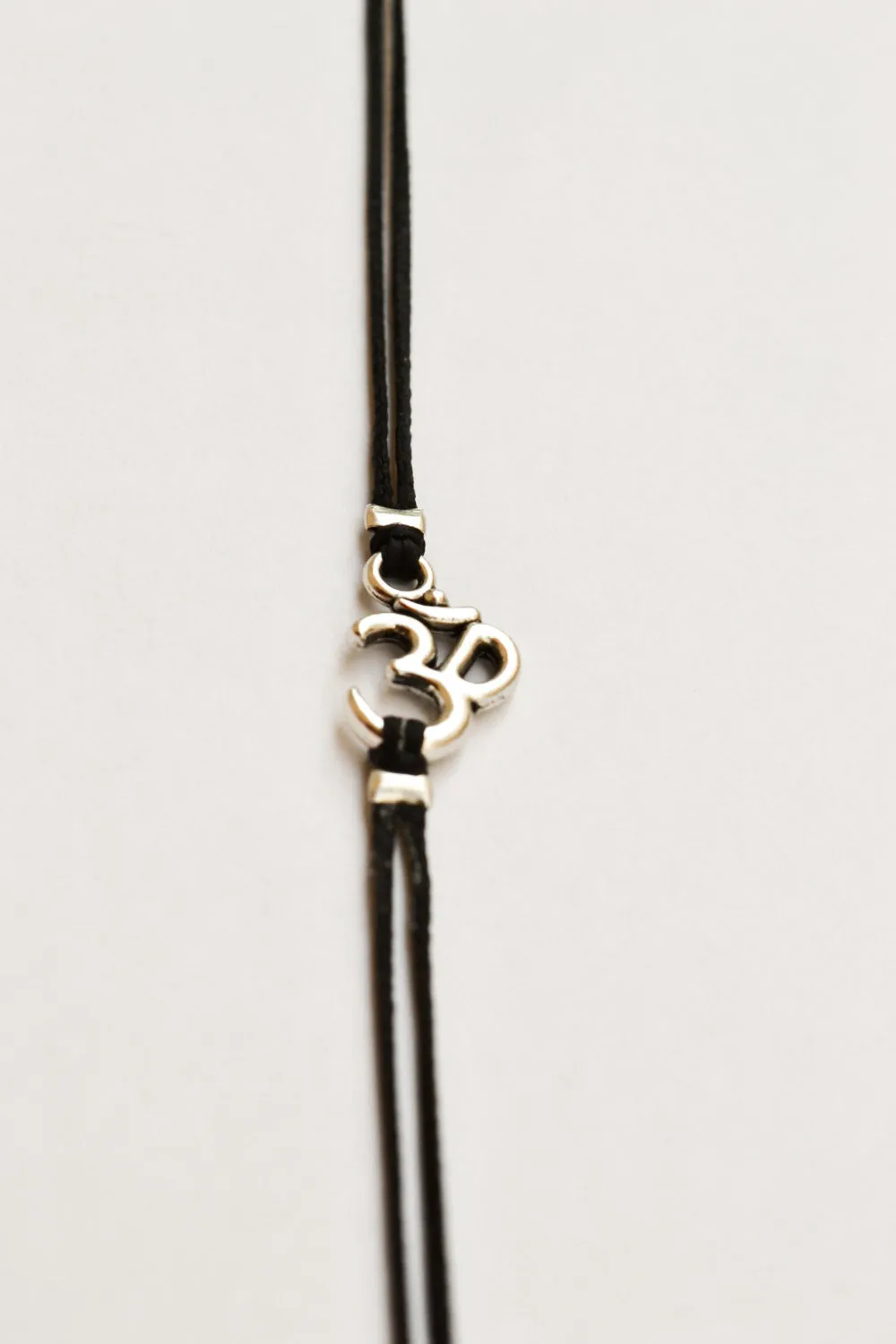 Women bracelet with silver tone Om charm, yoga jewelry