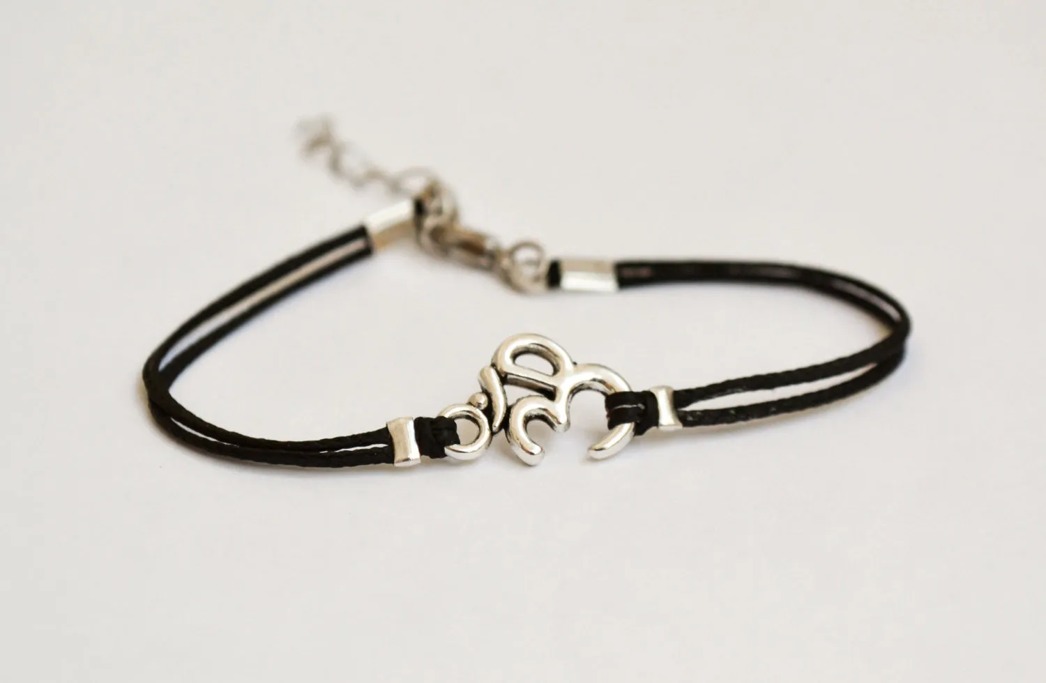 Women bracelet with silver tone Om charm, yoga jewelry